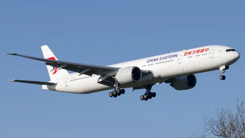B-7343 · Boeing 777-39P(ER) · EGKK
